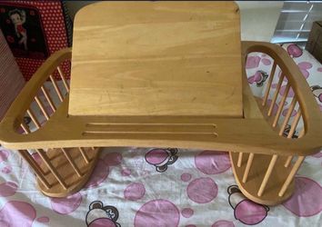 A wooden table Good Condition.