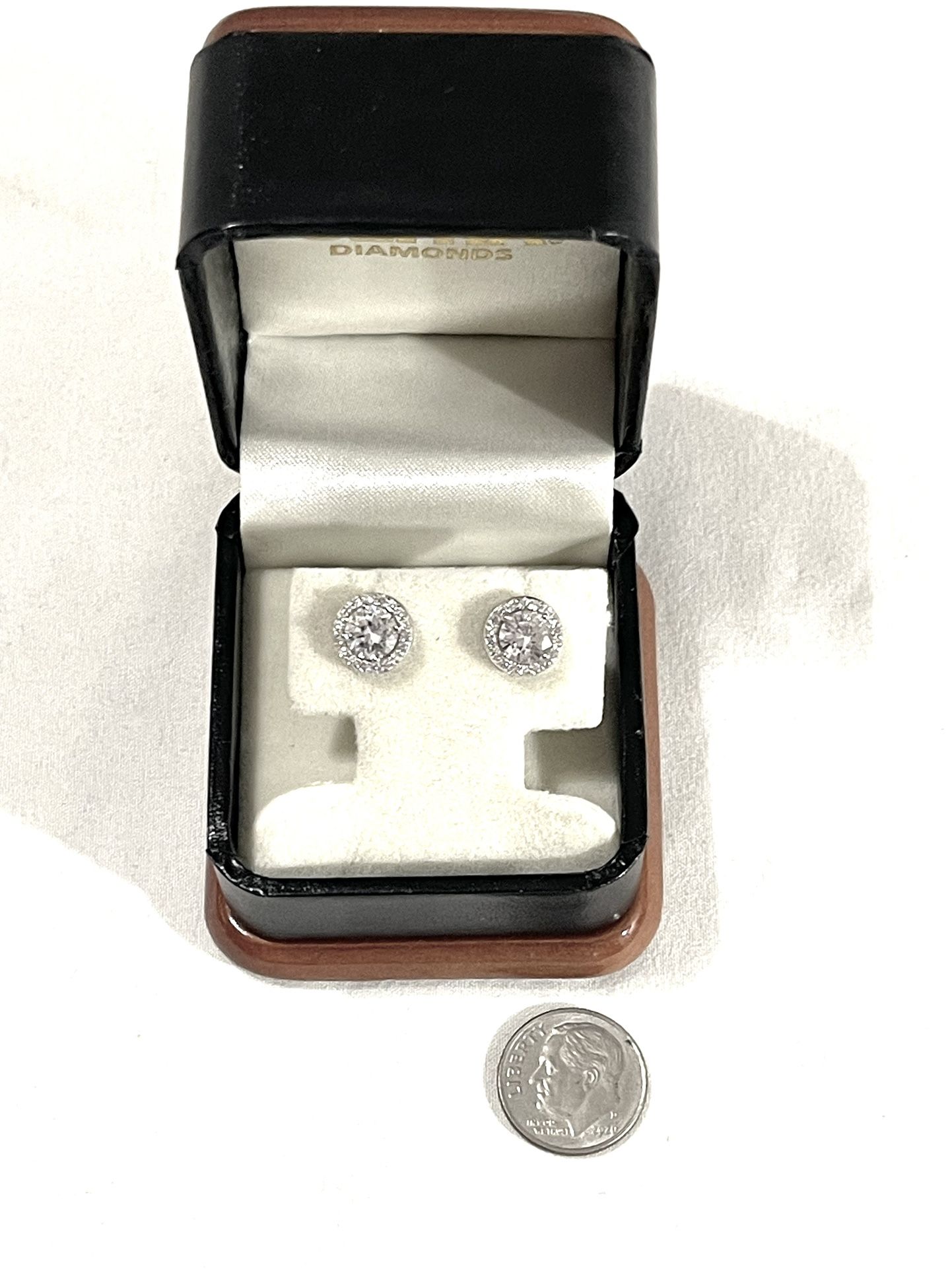 Brand New Cubic Zirconia CZ Diamond .925 Silver Stud Earrings.