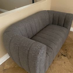 Modern curved sofa / loveseat in very good condition $40 Firm