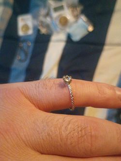 Promise ring banded it's got a gemstone rhinestone