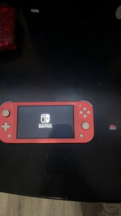 Nintendo Switch Lite Pink Coral with 32GB memory card
