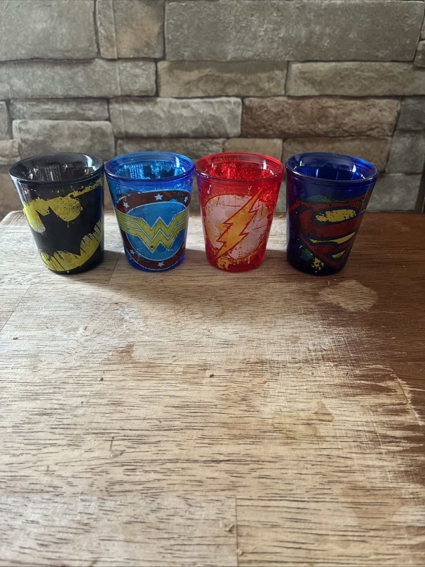 Set of 4 Plastic Superhero Shot Glasses - Batman, Wonder Woman, Flash, Superman