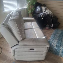 Leather reclining loveseat