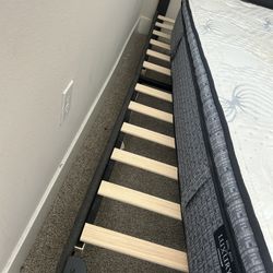 Eastern king mattress With Bed Frame. 