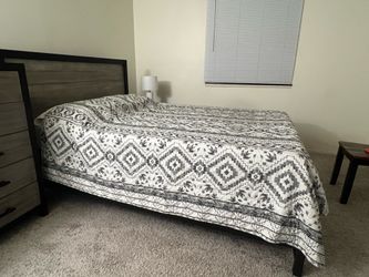 Wooden Queen Size Bed with a Mattress
