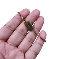 Gold Toned Link Monogram Horoscope Leo Bracelet