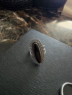 Black Onyx filigree style sterling silver adjustable ring