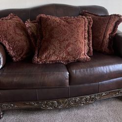 Leather Sofa And Loveseat Set. 