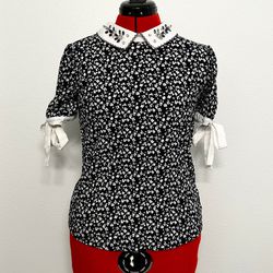 Short-Sleeved Collared Blouse with Tie String Sleeves and Gemstone Accents