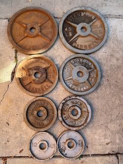Olympic Weights 45s 35s 25s and 10s solid weights 230lbs all for $170 firm. Need a good cleaning or can be used as is.