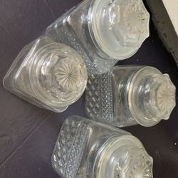 Vintage glass canisters great for organizing kitchen or crafts