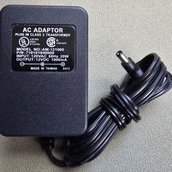AC Adapter Adaptor Model No: AM-121000 P/N: (contact info removed)40000 Output: 12VDC 1000mA/1A
