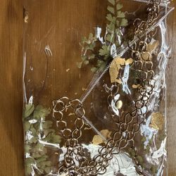 Clear Vinyl Clutch with Gold Chain & Botanical Detail – Statement Bag