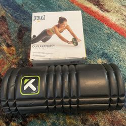 Everlast exercise wheel and a black foam roller. 