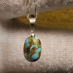 Kingman Turquoise Pendant Polished Nugget Stabilized Sterling Silver Bail 