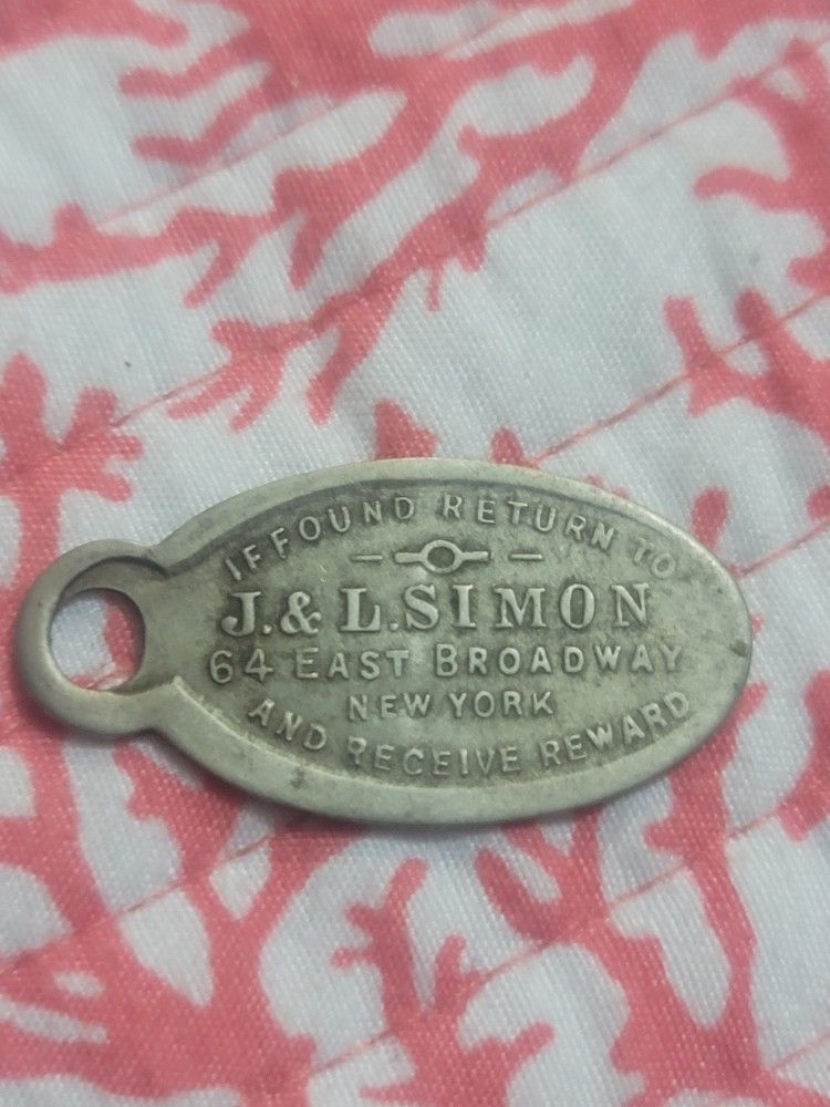 J & L Simon Broadway, NY advertising key  if found return and get a reward


