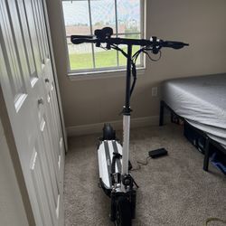 EMOVE CRUISER 52V 1600W DUAL SUSPENSION FOLDABLE ELECTRIC SCOOTER