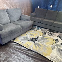 gray couch and loveseat good condition clean  no flaws we sell all the time delivery extra 40