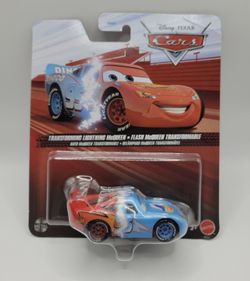 Disney Pixar Cars Transforming Lightning McQueen Dinoco Red Blue