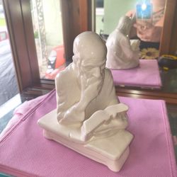 Vintage ceramic figurine trinket of a seated scholar or thinker reading a book