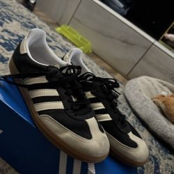 Tan/black Adidas 