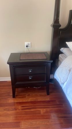 Cal king bed and two nightstands