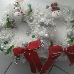 Two Decorated White Christmas Wreaths