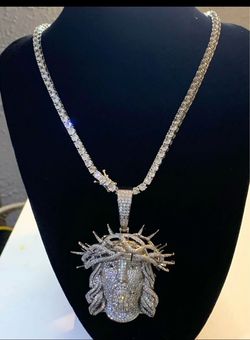Beautiful iced out 4mm 22in tennis chain with heavy solid Jesus pendant