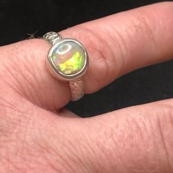 8927 Australian Crystal Opal ring from Lighting Ridge. Opal is 3.2ct 10x10x6mm Green and Blue broad flashes. Size USA 8