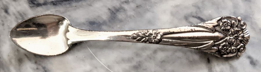 Beautiful vintage Coro sterling silver brooch in the shape of a spoon- approx 2.9" long and .5" wide- has some patina.