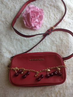 Michael kors like new crossbody red leather with cherry chain