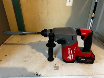 TOOL ONLY. Milwaukee M18 Fuel Rotary Hammer is a power tool designed for drilling and hammering applications. It features a 1-inch SDS Plus chuck and 