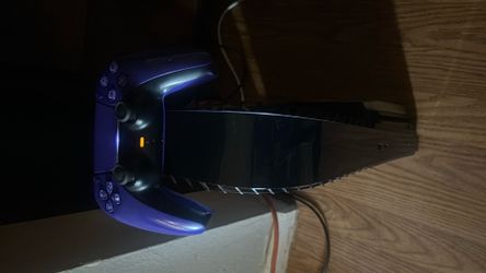 PlayStation 5 with controller