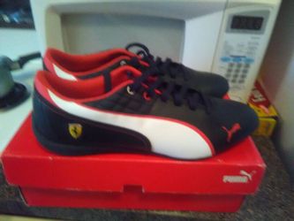 Leather pumas new in box size 11