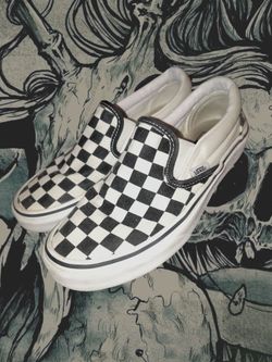 Vans checkerboard slip on shoes