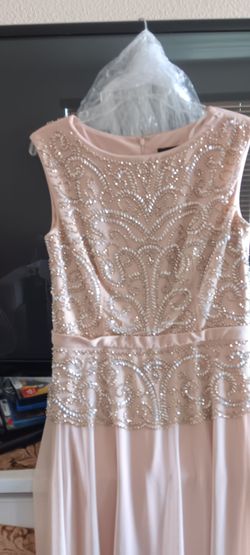 Mother of the Bride dress size 8 its very Elegant and looks Rich the color is blush