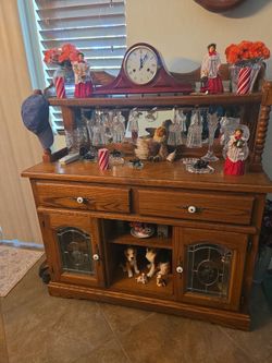 Antique oak dry bar perfect mirror is perfect. Doors and drawers open very heavy