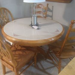 Round Dinette with Tile Surface and 4 Chairs