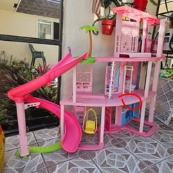 Barbie Dreamhouse Pool Party Doll House and Playset.
You need a truck 🚚