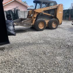 Case 40xt Skid Steer ,  and Attachments.