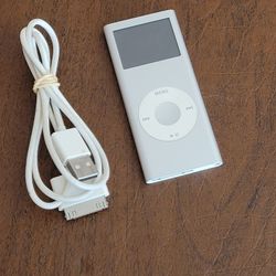Apple iPod Nano 2nd Generation 2GB Silver MP3 Music Player A1199. 
Pre-owned, in good working and cosmetic shape. Functionality 10 out of 
10. Cosmeti