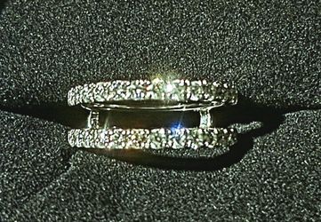 #: (contact info removed)5
1/2 CT. T.W. Certified Diamond Solitaire Enhancer in 14K White Gold (F/VS2)