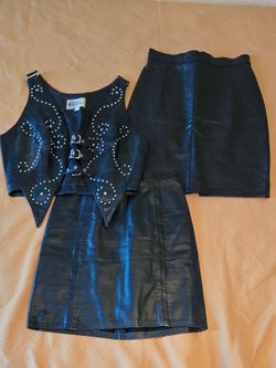 Leather vest and TWO leather skirts