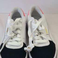 women's Puma Cali Remix sneakers in a black, white, and hot pink colorway