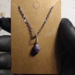 Sterling silver tanzanite wire wrap necklace 