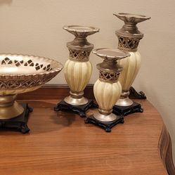 3 candle holders and a bowl set