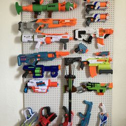 Nerf Guns W/ Pegboard Wall