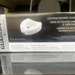 Locking Elevated Toilet Seat Never Used 