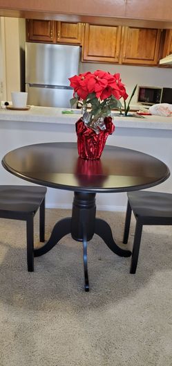 Drop leaf solid wood table and chairs