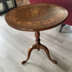 Beautiful antique table with wood inlay design